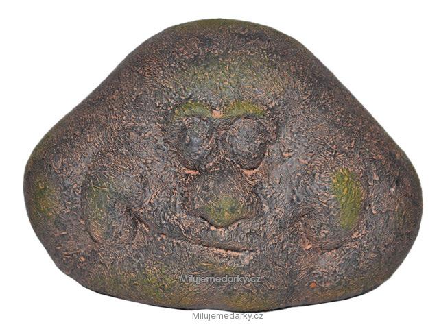 keramický kámen s obličejem